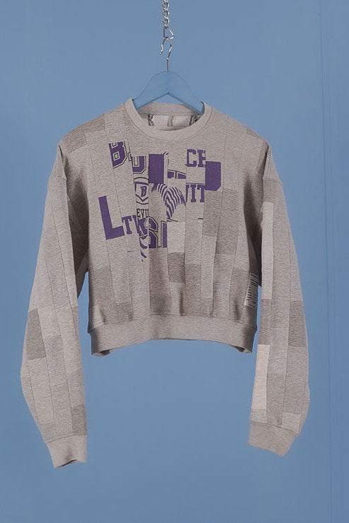 CROPPED PUZZLE SWEATSHIRT