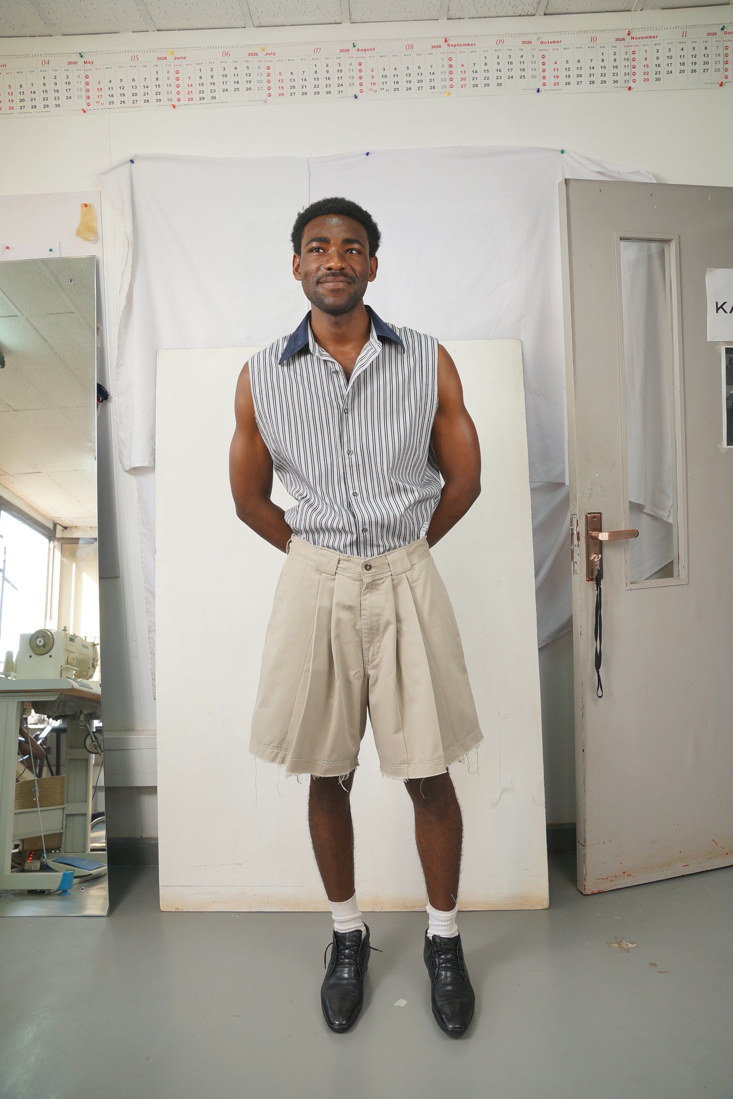 PLEATED CHINO SHORTS